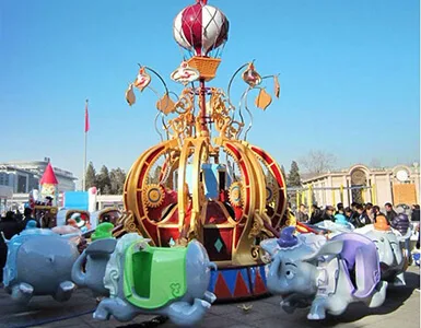 Carnival theme park flying elephant ride Carnival theme park flying elephant